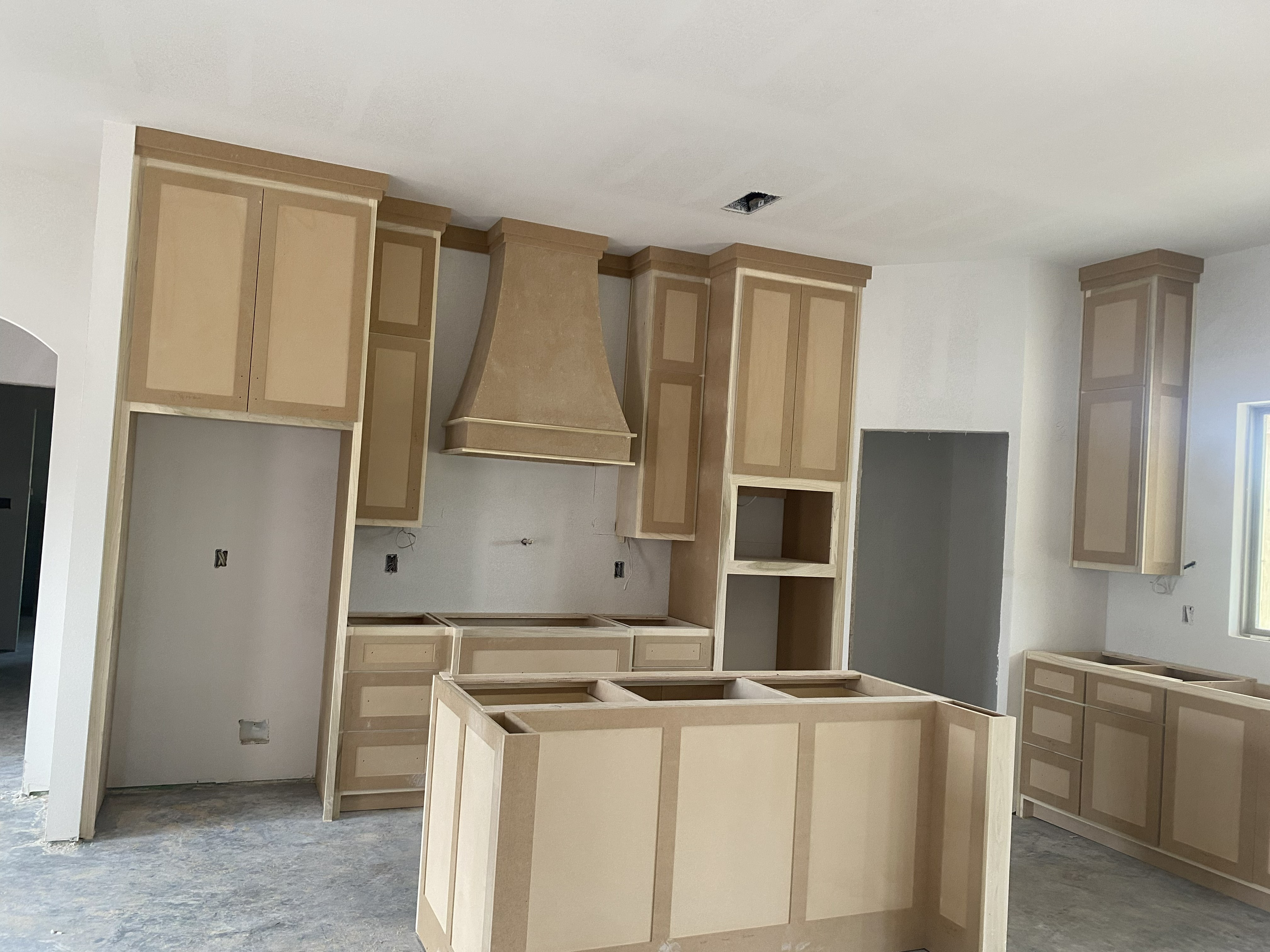 Unfinished installed cabinets